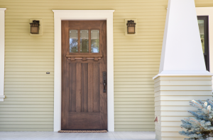 Wooden front door with a new lock in Addison, Illinois